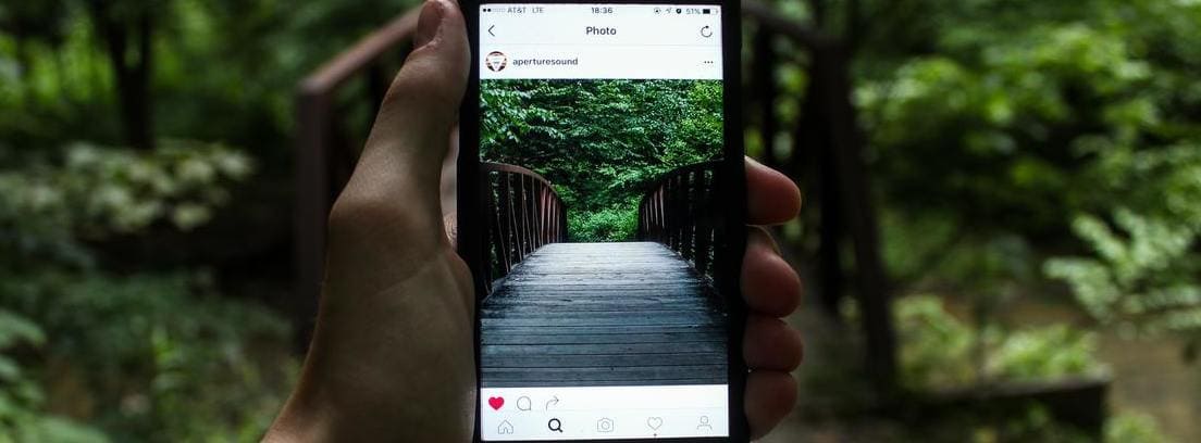 apps para editar fotos con instagram persona con un móvil con instagram una de las apps para editar fotos