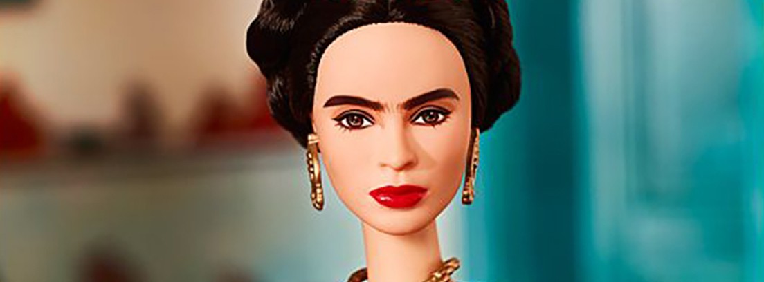 Las muñecas Barbie frida kahlo Muñeca con pelo recogido con flores rojas, falda azul y cuerpo bordado con flores