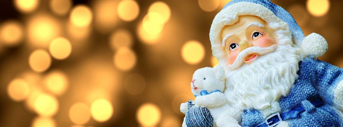 Figura de Papá Noel vestido de azul