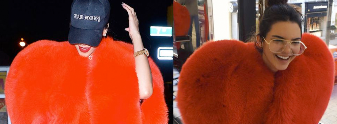 Rihana y Kendall Jenner con abrigo rojo de Yves Saint Laurent